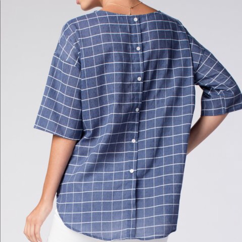 Blue top with buttons on back